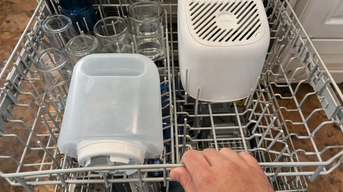 3 Proven Easy to Clean Cool Mist Humidifier Picks (2026) 2 Loading the Canopy Bedside Humidifier 2.0 plastic components into the top rack of a dishwasher