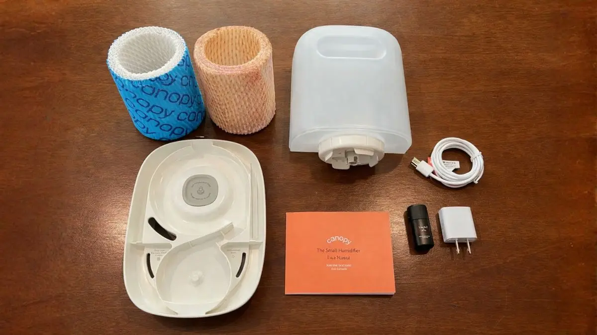 Canopy Bedside Humidifier 2.0 maintenance showing why it is the best cool mist humidifier for baby room setups, featuring a clean filter next to a used one